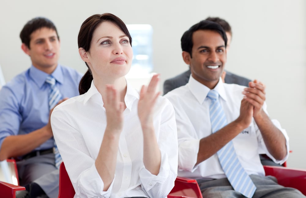 International business people clapping at a conference. Business concept.